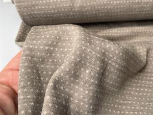 Undertøjsuld - interlock strikket i blid varm beige med lille nist