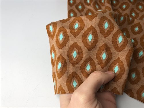 Viscosejersey - varme farver i fint mønster