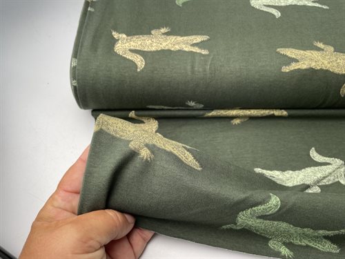 Bomuldsjersey - fine grønne krokodiller på grøn bund
