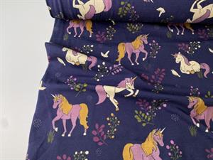 Bomuldsjersey - smukke enhjørninger på blålilla bund