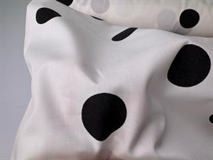 Vævet bomuldspoplin - sorte polkaprikker på hvid bund