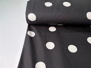 Vævet bomuldspoplin - hvide polkaprikker på sort bund