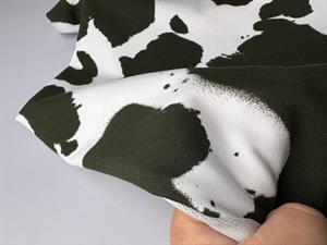 French terry - sortgrøn abstrakt på hvid bund