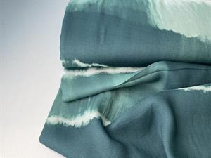 Fastvævet viscose - tie dye look i petrol toner