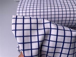 Skjortepoplin - garnfarvede tern i navy og offwhite