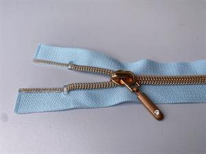 Lynlås - 2-vejs, lyseblå med rose gold plasttænder, 42 cm