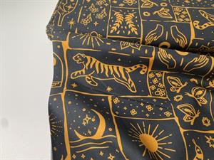 Fastvævet bomuldspoplin - spirituelle motiver på sort bund