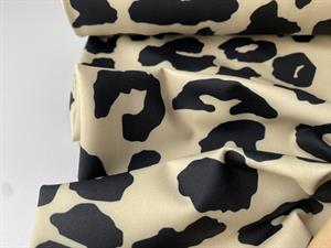 Sportsstræk / badedragt - lækker leo på lys bund