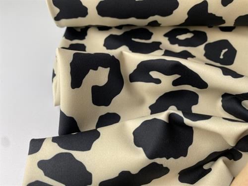 Sportsstræk / badedragt - lækker leo på lys bund