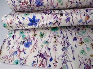 Twillvævet bomuldssatin - yndigste blomster på lys bund