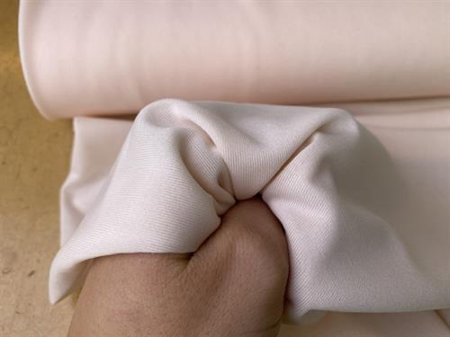 Polyesterjersey i mesh - pudder