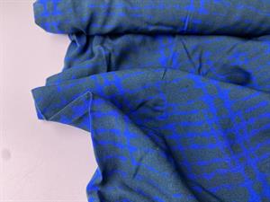 Fastvævet viscose - eksklusivt mønster på koboltblå bund