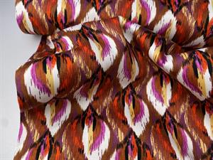 Satinvævet bomuld med stræk - zig zag mønster i fede farver