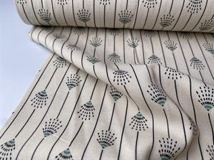 Fastvævet viscose - yndige motiver på lys bund