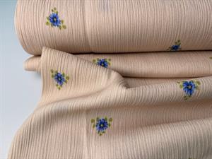 Fastvævet viscose - beige med fine små blå blomster 