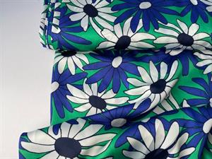 ​​​​​​​Fastvævet polyester satin - blomster i grønne og blå toner