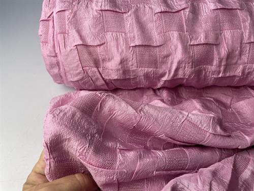 Fastvævet polyester - rosa med effekt vævning 