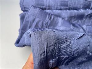 Fastvævet polyester i blå med effekt vævning 