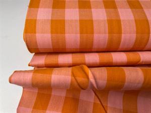 Fastvævet bomuld - tern med wow effekt, i orange/pink, kommer igen i uge 28