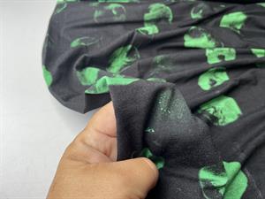 Viscosejersey - sort bund med fede pletter i grøn