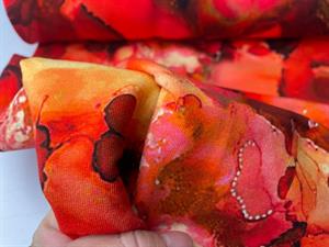 Isoli - varme røde, koralrøde og orange toner i marble mønster