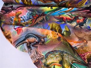 Bomuldsjersey - dinosaurer i juratiden i varme toner