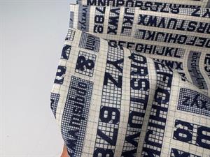 Patchwork stof - tal og bogstaver i flot design