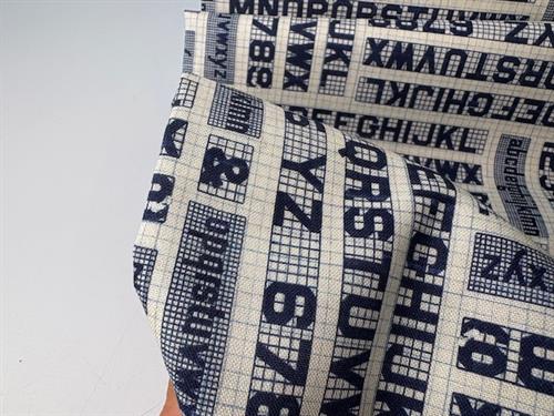 Patchwork stof - tal og bogstaver i flot design