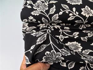 Viscosejersey - flotte blade på sort bund