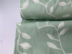 Fastvævet twill med stræk - yndige bladmotiver på mintgrøn bund