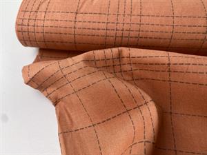 Fastvævet bomuldsvoile - ternet i varm peach