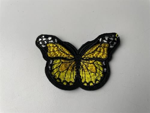 Symærke - gul sommerfugl