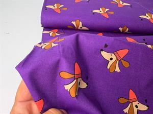 Fastvævet bomuldspoplin - efterårsklædte hunde på lilla bund