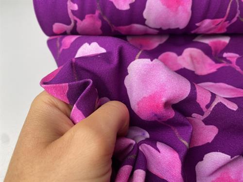Bomuldsjersey - fine akvarel blomster i lilla og lyserøde nuancer