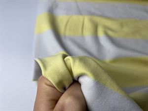 Bomuldsjersey - brede striber i pastel gul og lysegrå