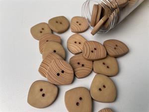Knap - beige med riflet mat overflade, 23 mm