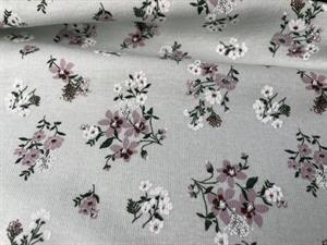 Bomulds interlock - blid grøn med blomster 