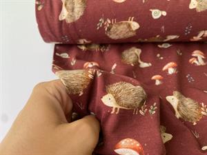 Bomuldsjersey - søde pindsvin på støvet mørkerød bund