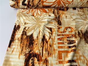 Polyesterjersey - sommerprint i gyldne toner