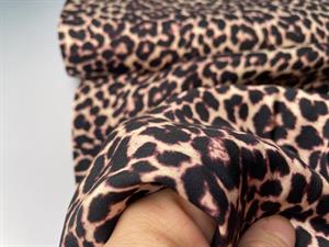 Fastvævet viscose - satinvævet og med leoprint i sort og brun, kommer igen uge 23