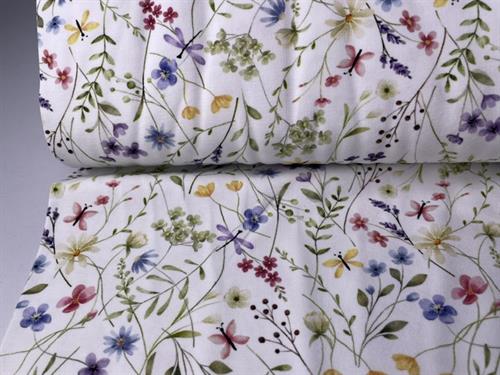 Bomuldsjersey - små pastelfarvede blomster på hvid bund