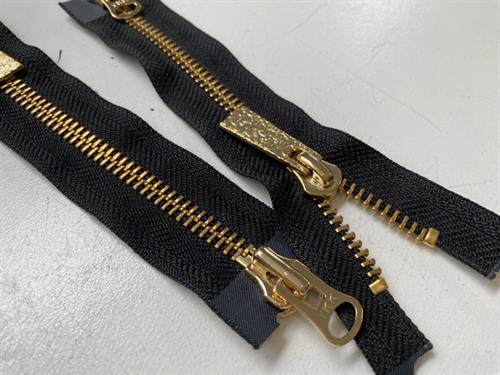 Delbar lynlås - 2-vejs, sort med guld metaltænder, 18 cm