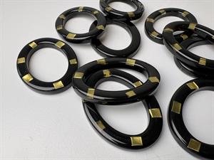 Spænde - sort og ovalt med guld