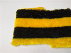 Fake fur - brumbasse, stribet gul/sort