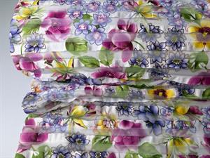 Effekt jersey - små flæser på transparent bund