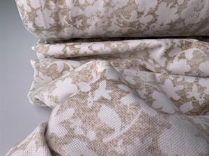 Bomulds interlock - piquestrikket, beige med hvide blomster