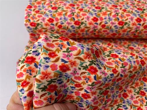 Bomuldsjersey - små blomster i friske forårsfarver