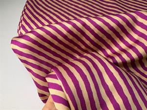 Satinvævet viscose - lækre diagonal striber i creme og lilla