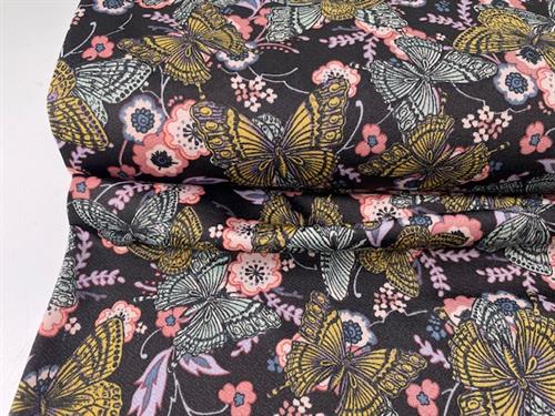 Polyesterjersey - yndige blomster og sommerfugle på mørk bund