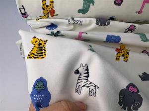 Bomuldsjersey - safaridyr på offwhite bund